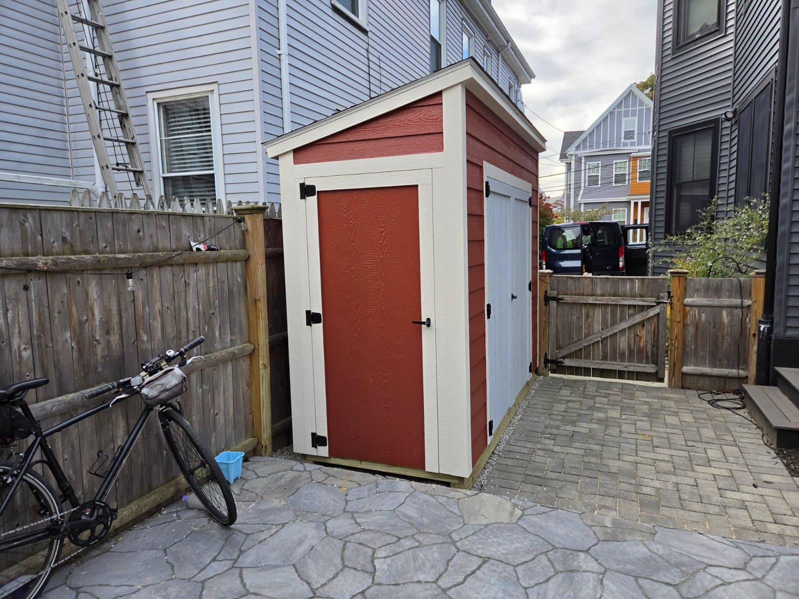 A real 4x10 Modern with lap siding siding, built onsite in Somerville, MA